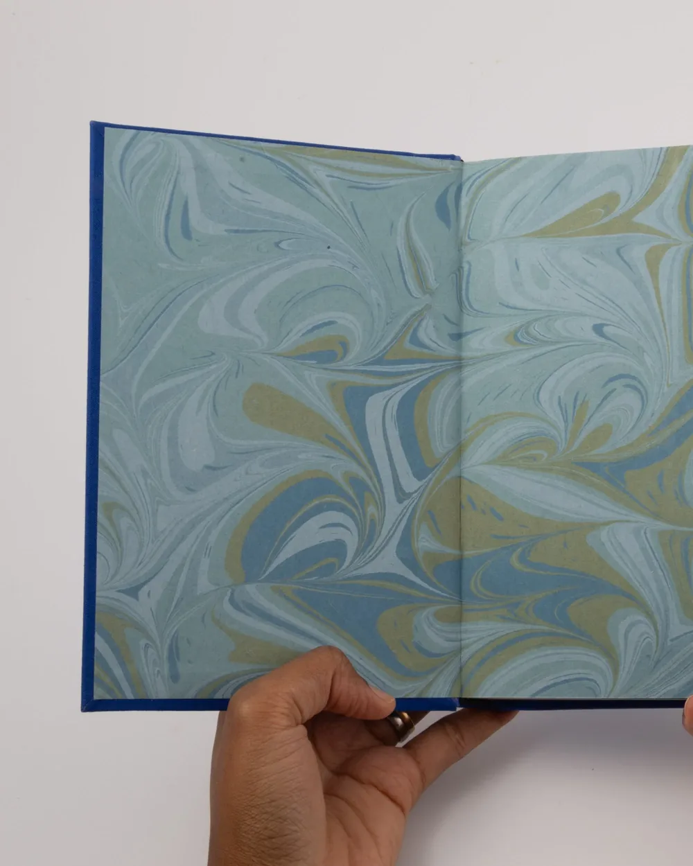 Open book with marbled paper